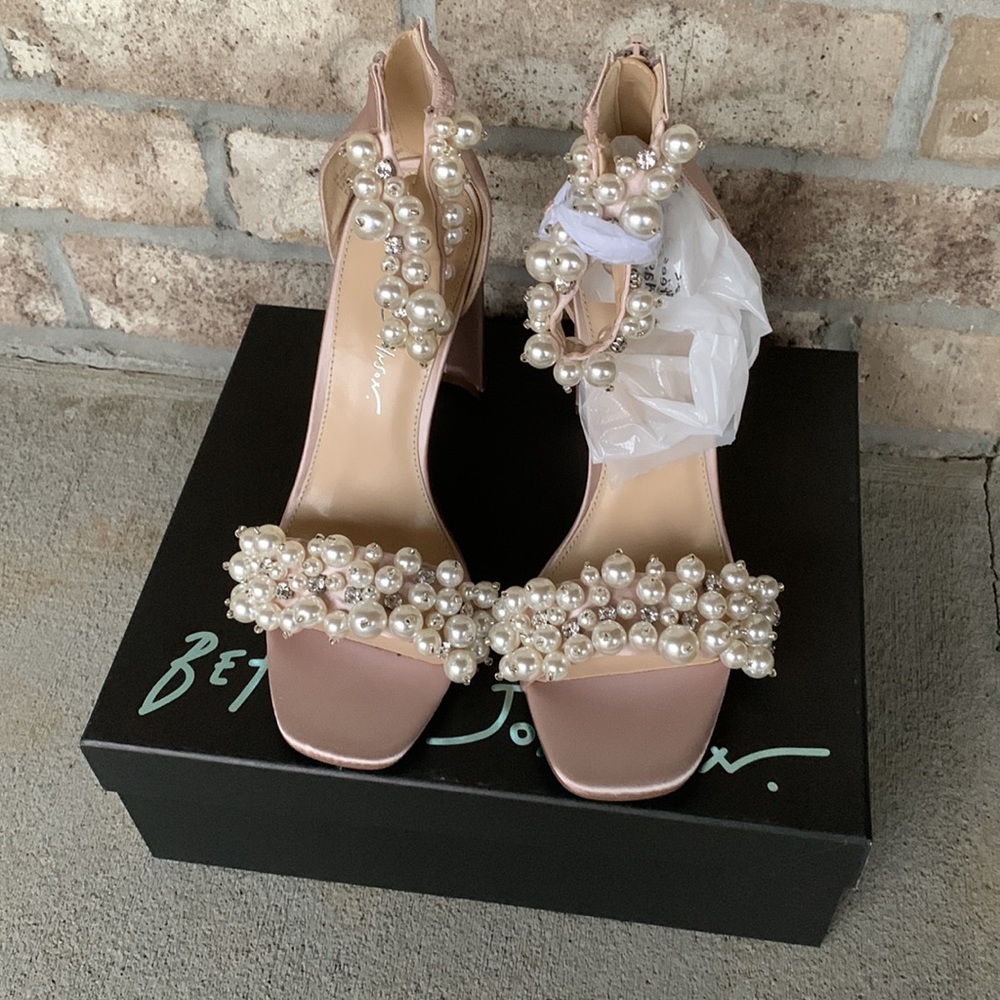 Pearl and rhinestone heels.
